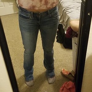 Skinny kick light wash hole jeans